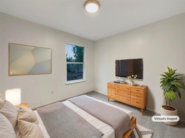 bedroom featuring baseboards