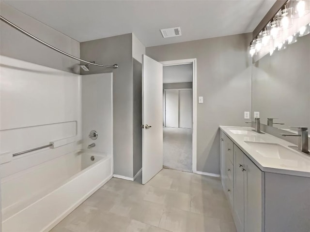 full bathroom featuring double vanity, bathing tub / shower combination, a sink, and visible vents