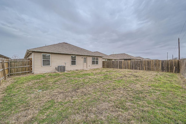 112 Quarton Dr, Hutto, TX 78634 - rear view of property with central AC unit