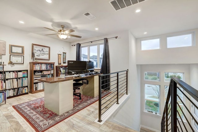 home office with baseboards, visible vents, and recessed lighting