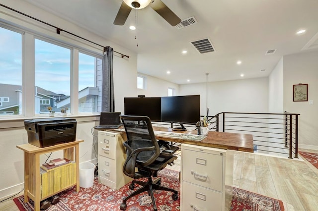 home office featuring visible vents and recessed lighting