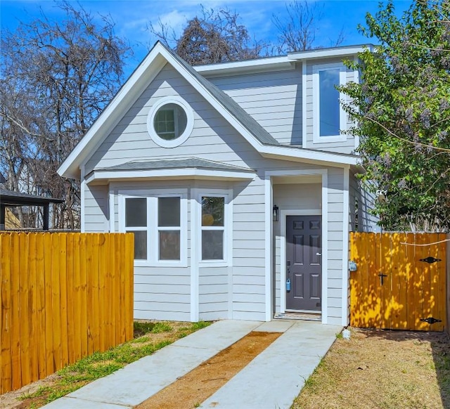 view of front of home with fence