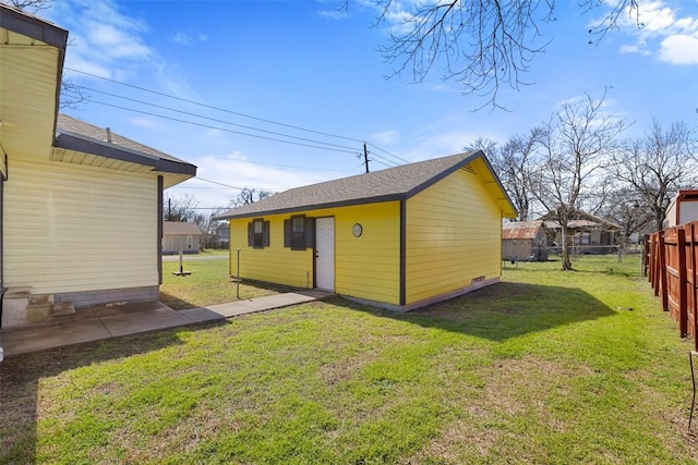 view of outbuilding with an outbuilding and fence