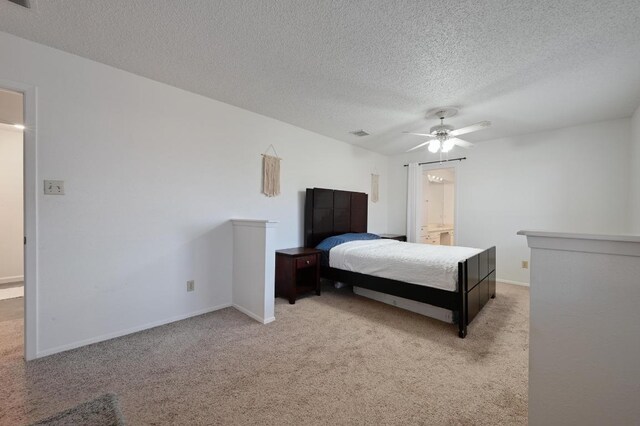 bedroom featuring visible vents, baseboards, a ceiling fan, a textured ceiling, and carpet flooring