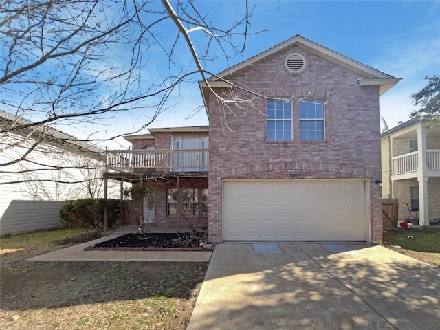 view of front facade with concrete driveway, brick siding, and an attached garage