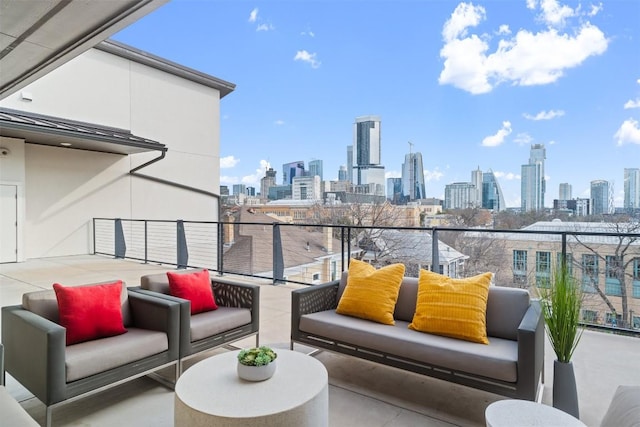 balcony featuring a city view