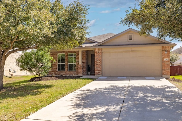 ranch-style home with a garage, driveway, brick siding, and a front lawn