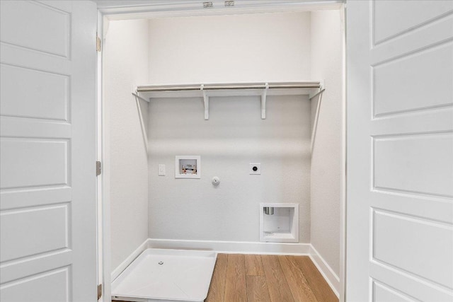 842 Nadal Path, Round Rock, TX 78664 - washroom with gas dryer hookup, electric dryer hookup, baseboards, wood finished floors, and washer hookup