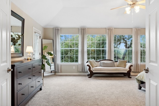 sunroom / solarium featuring ceiling fan and vaulted ceiling