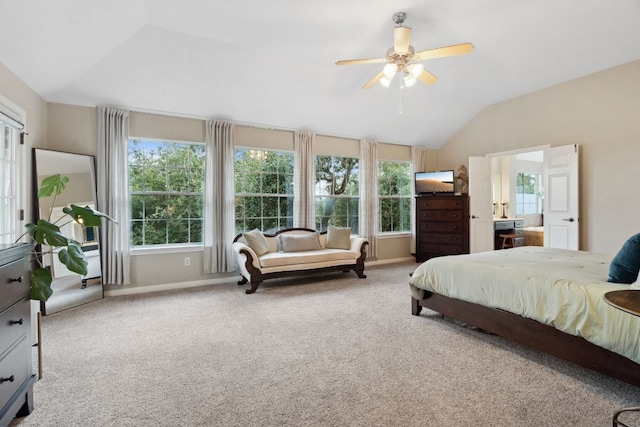 carpeted bedroom with vaulted ceiling, ceiling fan, and baseboards