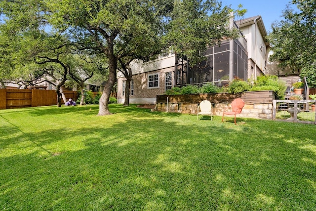 view of yard featuring fence