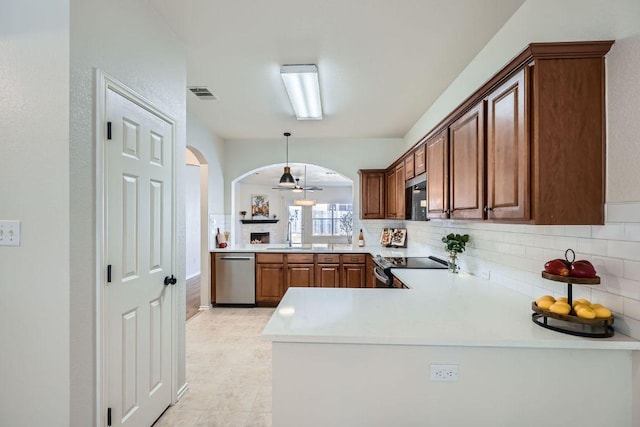 kitchen with a peninsula, range with electric stovetop, visible vents, dishwasher, and tasteful backsplash