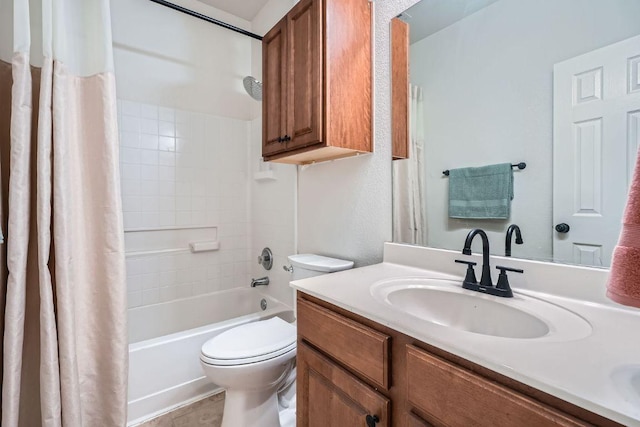 full bathroom featuring shower / tub combo, tile patterned flooring, vanity, and toilet