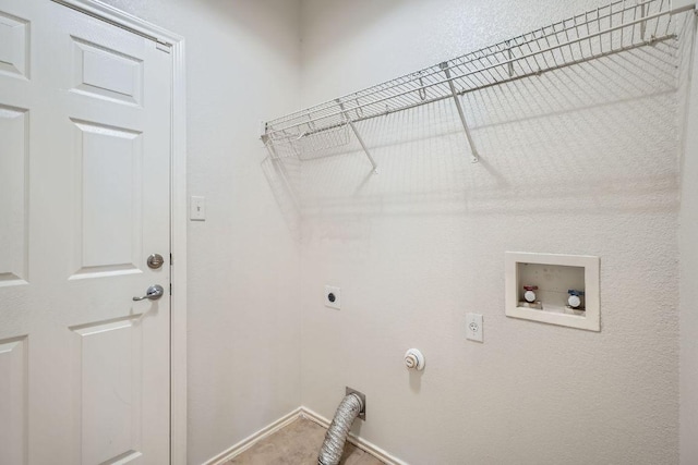 laundry room featuring hookup for a washing machine, hookup for an electric dryer, gas dryer hookup, laundry area, and baseboards