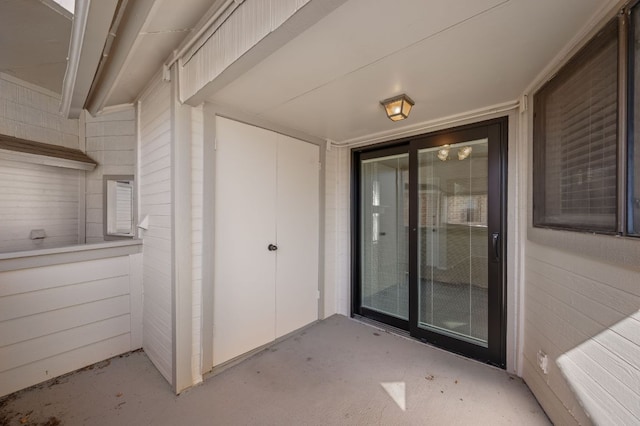 doorway to property featuring a patio