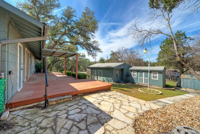 5600 Lakeview Dr, Austin, TX 78734 - view of patio with an outdoor structure and a deck