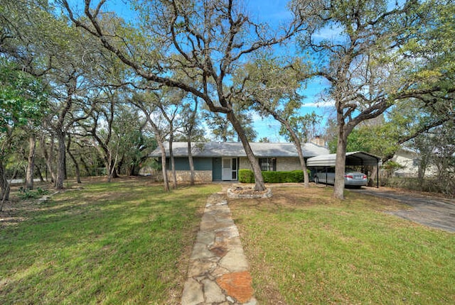 5600 Lakeview Dr, Austin, TX 78734 - view of front of house featuring a front yard, aphalt driveway, and a carport