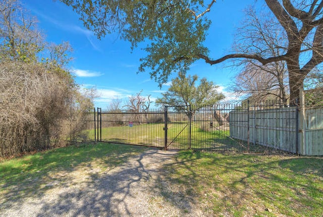 view of yard featuring a gate and fence