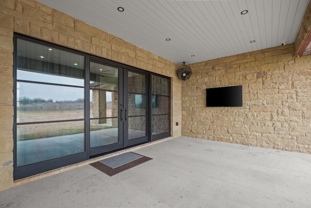 doorway to property with french doors and a patio area