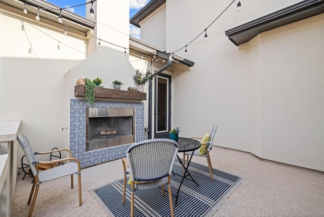 view of patio / terrace with a fireplace