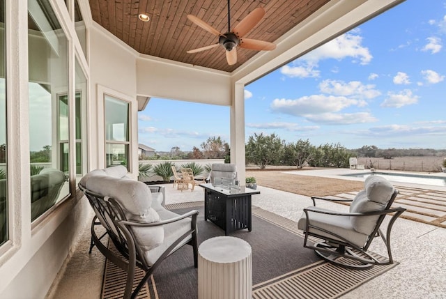 view of patio with ceiling fan