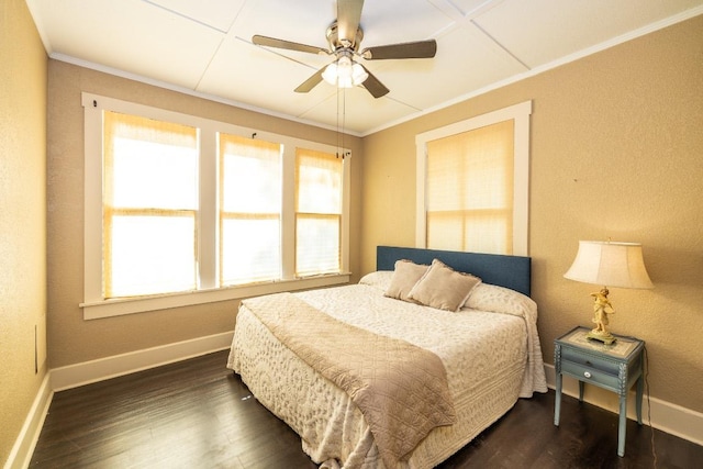 626 Saint Vincent St, Gonzales, TX 78629 - bedroom with baseboards, ornamental molding, dark wood-type flooring, and ceiling fan