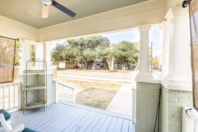 626 Saint Vincent St, Gonzales, TX 78629 - wooden porch with a ceiling fan