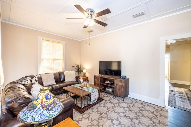 626 Saint Vincent St, Gonzales, TX 78629 - living room featuring ceiling fan, baseboards, coffered ceiling, crown molding, and wood finished floors