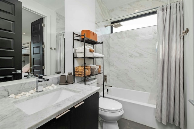 bathroom featuring shower / tub combo, tile patterned flooring, vanity, and toilet