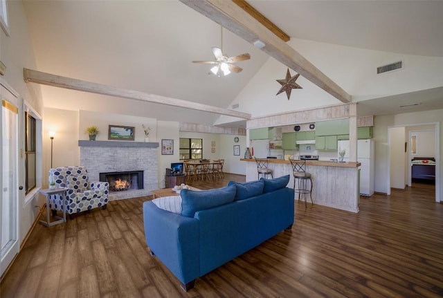 living room with high vaulted ceiling, beam ceiling, visible vents, and dark wood finished floors