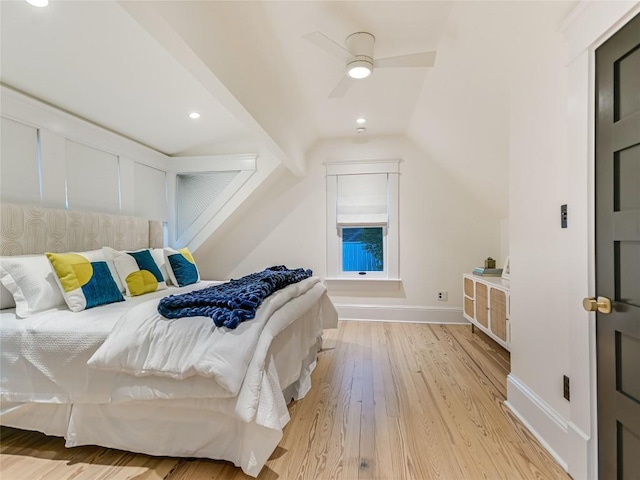 bedroom featuring baseboards, a ceiling fan, vaulted ceiling, light wood-type flooring, and recessed lighting