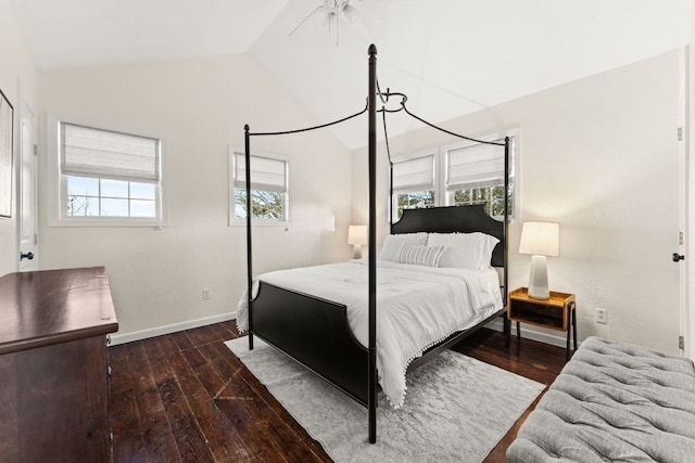 bedroom featuring wood-type flooring, baseboards, and vaulted ceiling