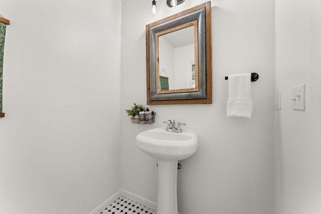 bathroom featuring baseboards