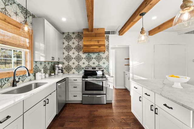 kitchen with stainless steel appliances, dark wood-type flooring, a sink, decorative backsplash, and beamed ceiling