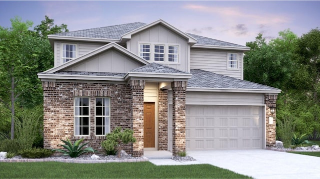 view of front of property featuring board and batten siding, brick siding, driveway, and a shingled roof