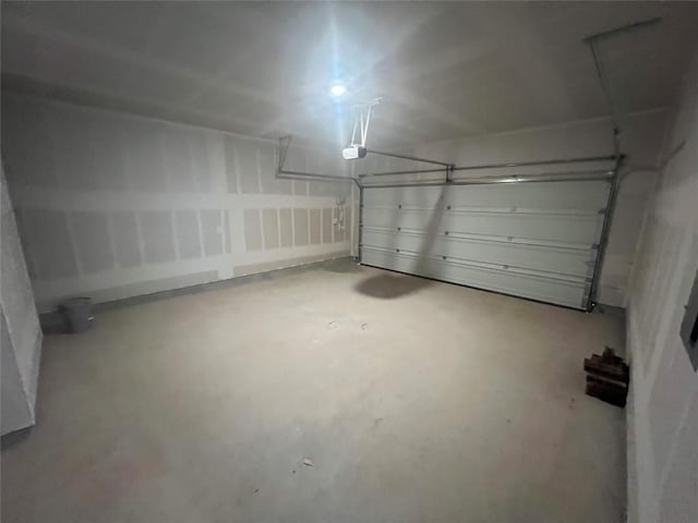 151 Cibolo Creek Loop, Bastrop, TX 78602 - garage featuring a garage door opener
