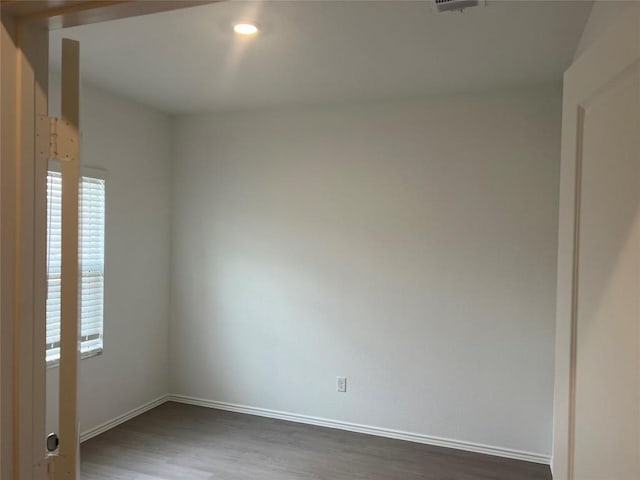 151 Cibolo Creek Loop, Bastrop, TX 78602 - unfurnished room with wood finished floors and baseboards
