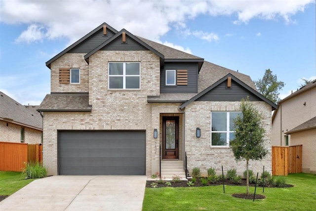 5804 Kelly Kyle Ave, Georgetown, TX 78628 - craftsman-style house with an attached garage, roof with shingles, concrete driveway, and brick siding