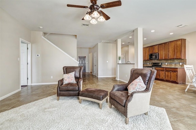 sitting room with recessed lighting, visible vents, baseboards, and light tile patterned floors