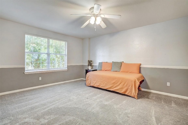 bedroom featuring carpet, ceiling fan, and baseboards