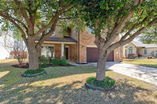 view of front of property featuring concrete driveway, brick siding, a front lawn, and an attached garage