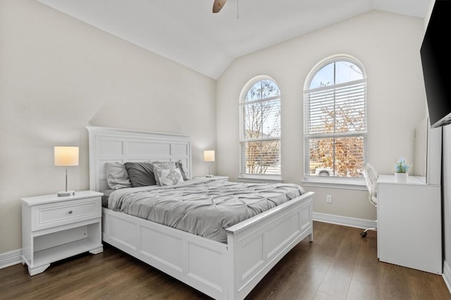 bedroom featuring lofted ceiling, ceiling fan, dark wood-type flooring, and baseboards