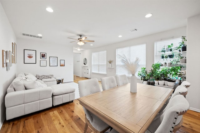 dining area featuring a ceiling fan, recessed lighting, visible vents, and light wood finished floors