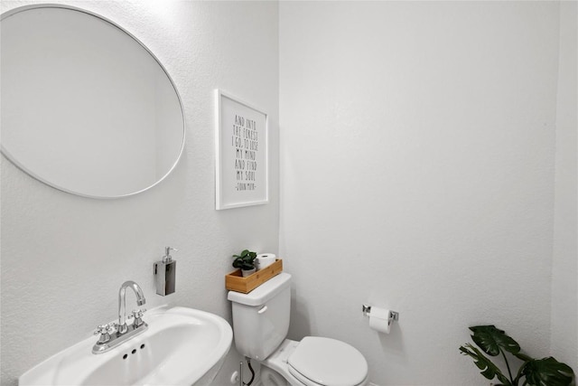 12102 Tolson Dr, Manor, TX 78653 - half bath featuring toilet and a sink
