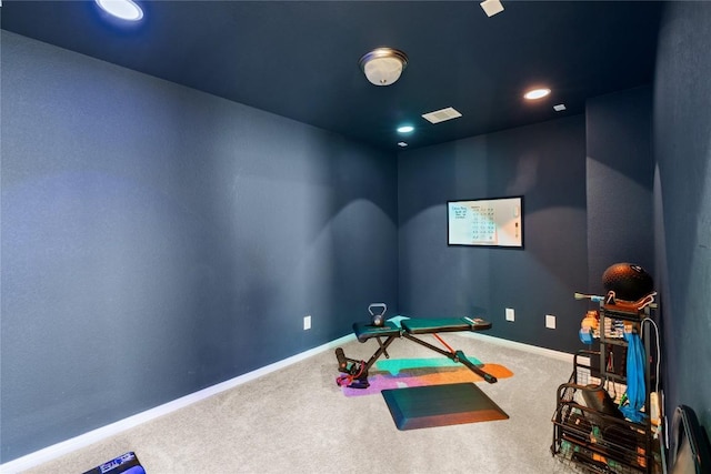 exercise room featuring carpet, visible vents, baseboards, and recessed lighting