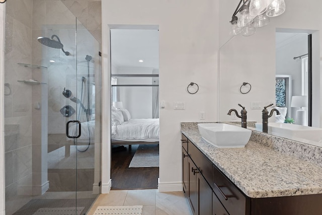 full bath featuring ornamental molding, ensuite bath, a shower stall, and vanity