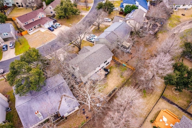 birds eye view of property with a residential view