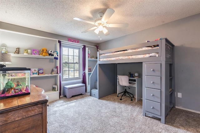 bedroom with carpet floors, a textured ceiling, and a ceiling fan