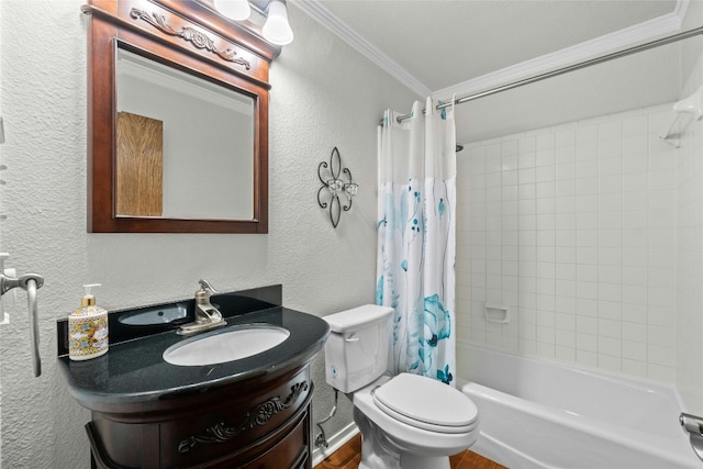 bathroom with crown molding, a textured wall, toilet, shower / tub combo, and vanity