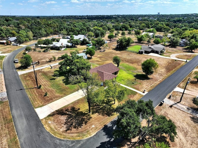 bird's eye view featuring a forest view